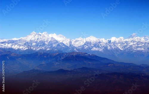 The Himalayas range / Enormous of the Himalaya ranges above the cloud and layer of dust over Nepal