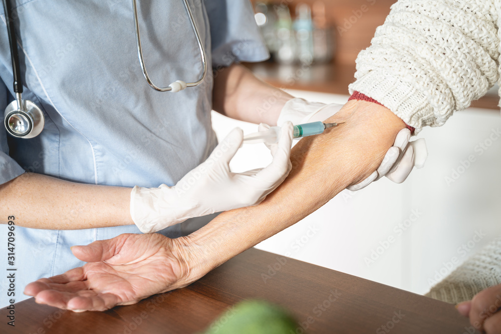 Close up of doctor that doing injection Close up of doctor that doing injection