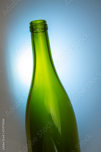 Empty wine bottle on a light gray background. Design element  cover. Web banner.