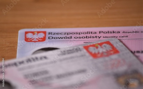 Polish old ID card and new with chip , translation of description: "Republic of poland Identity card" shallow depth of field.