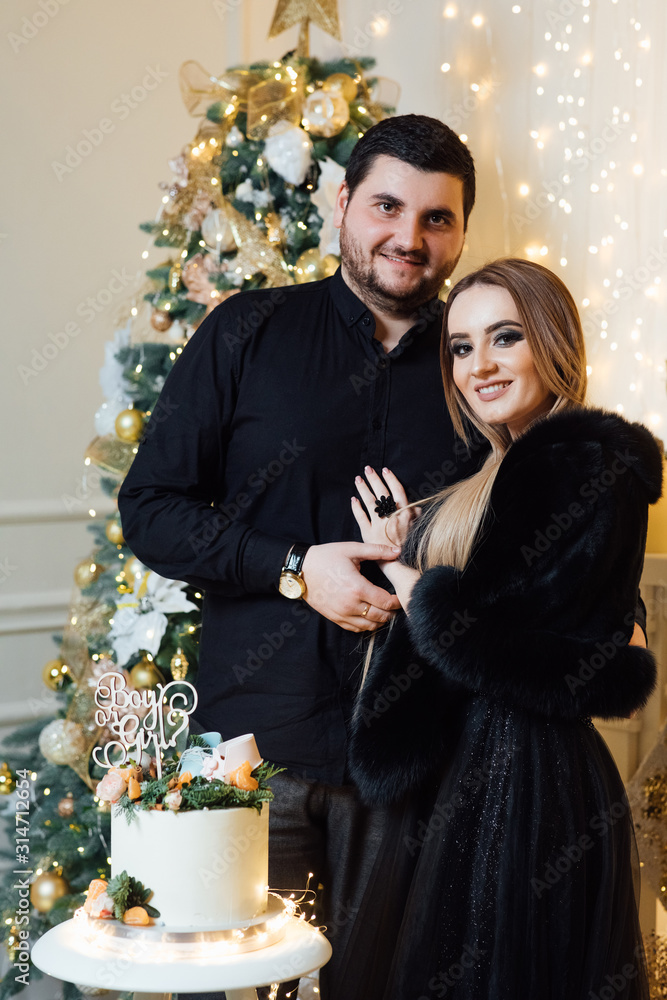 Gender reveal cake with mandarins on baby shower party. Fertility