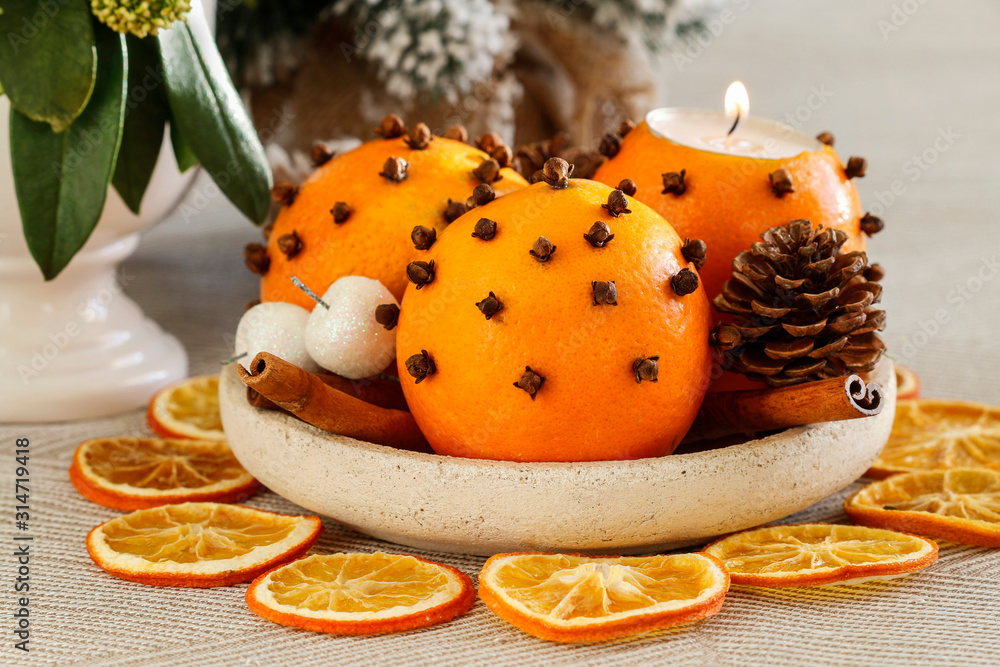 Orange pomander balls. Tradittional Christmas decoration.