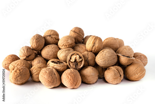 a large number of walnuts on a white background