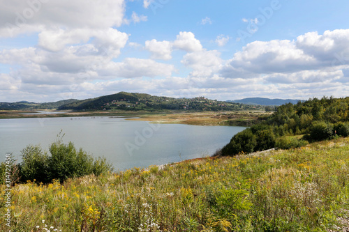 ZAGORZE, POLAND - SEPTEMBER 14, 2019: Panoramic view over the lake and hills