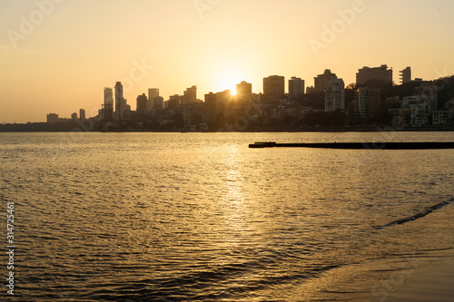 Sunset on Chowpatty beach in Mumbai. India © Elena Odareeva