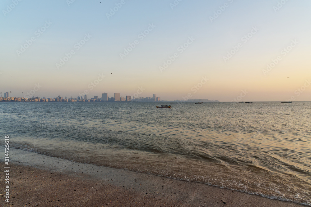 Sunset on Chowpatty beach in Mumbai. India Sunset on Chowpatty beach in Mumbai. India