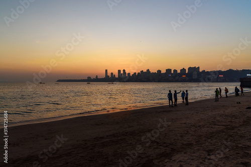 Sunset on Chowpatty beach in Mumbai. India photo