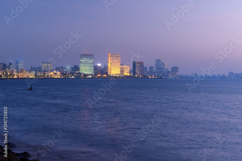 View of Waterfront from Chowpatty beach at night. Mumbai. India © Elena Odareeva