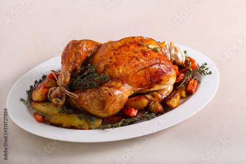 Roast whole chicken with roast vegetables