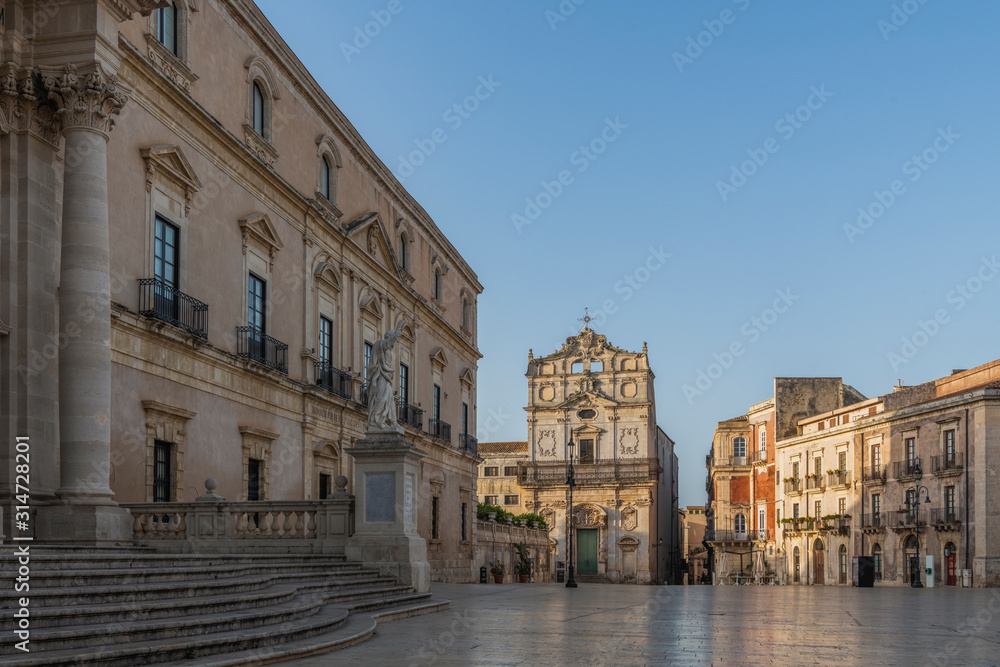 Main square and view of the church in the center of Ortigia island in province of Syracuse in Sicily, south Italy
