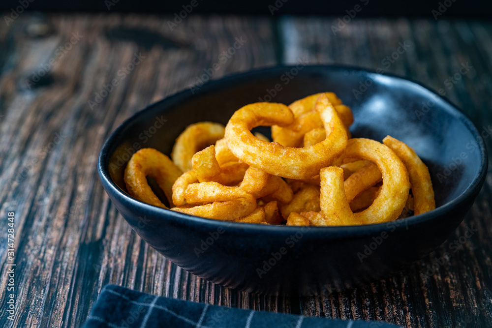 Spicy Seasoned Curly Fries Ready to Eat with Sauce. Spicy Seasoned Curly Fries Ready to Eat with Sauce.