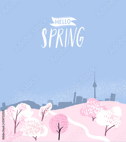 Spring flowers festival in Seoul. Namsan tower during cherry blossom. Pink blooming hills  korean park. Hello spring handwritten text.