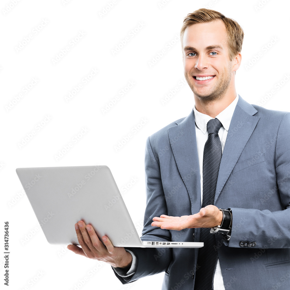 Happy smiling businessman in grey confident suit, working with laptop, isolated against white background. Success in business concept. Square composition. Happy smiling businessman in grey confident suit, working with laptop, isolated against white background. Success in business concept. Square composition.