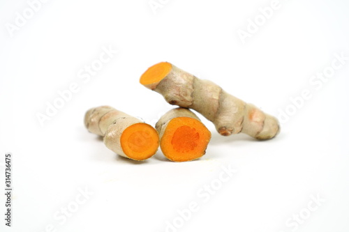 Wallpaper Mural Fresh turmeric isolated on a white background is used as a tonic for the body and food ingredients. Torontodigital.ca