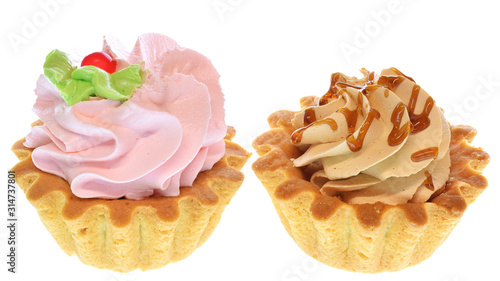 Two tartlet cake with strawberry cream and carame