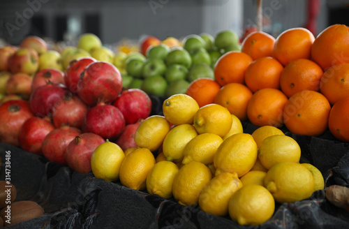 Tasty fresh fruits on counter at wholesale market
