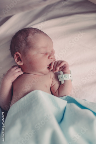 Newborn baby sleeping in hospital