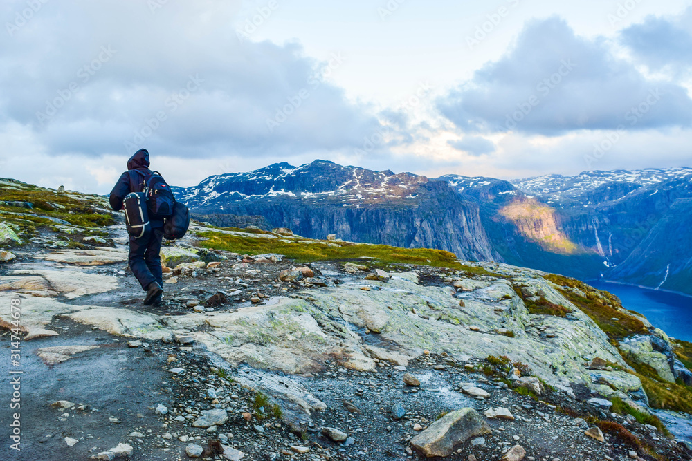 Tourist walk along the trail to Trolltunga, Norway.