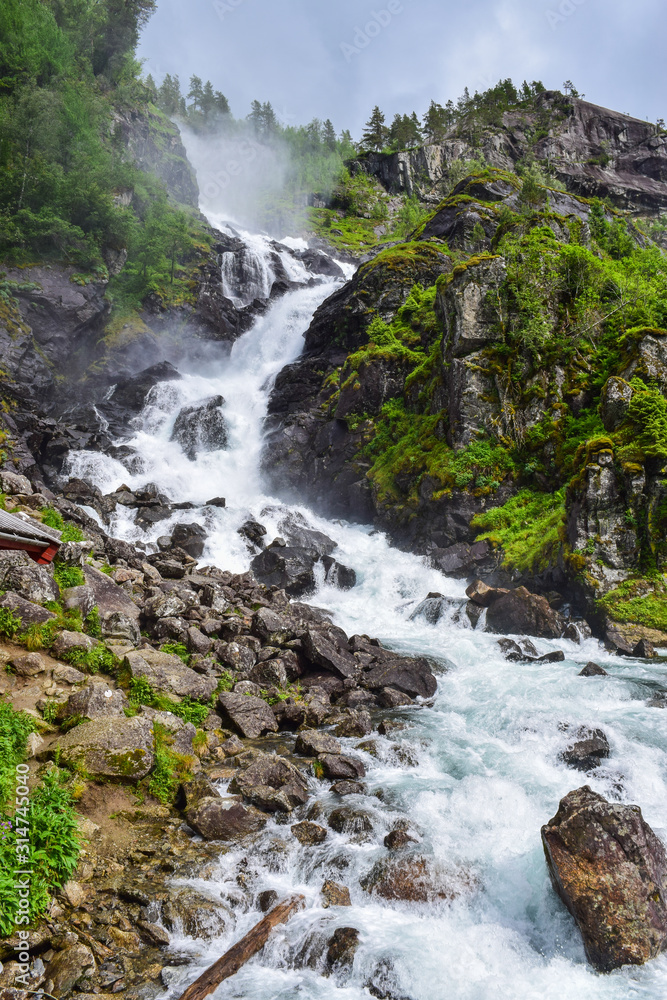 Naklejka premium Langfossen Waterfall, Norway.