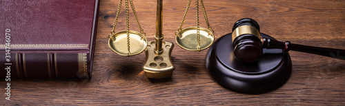 Gavel Near Book With Golden Scale