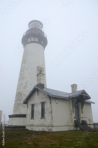 The Yaquina Head lighthouse shrouded in mist