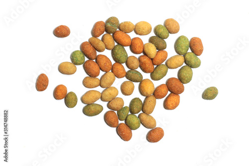 spicy peanuts are a different color and flavor on a white isolated background
