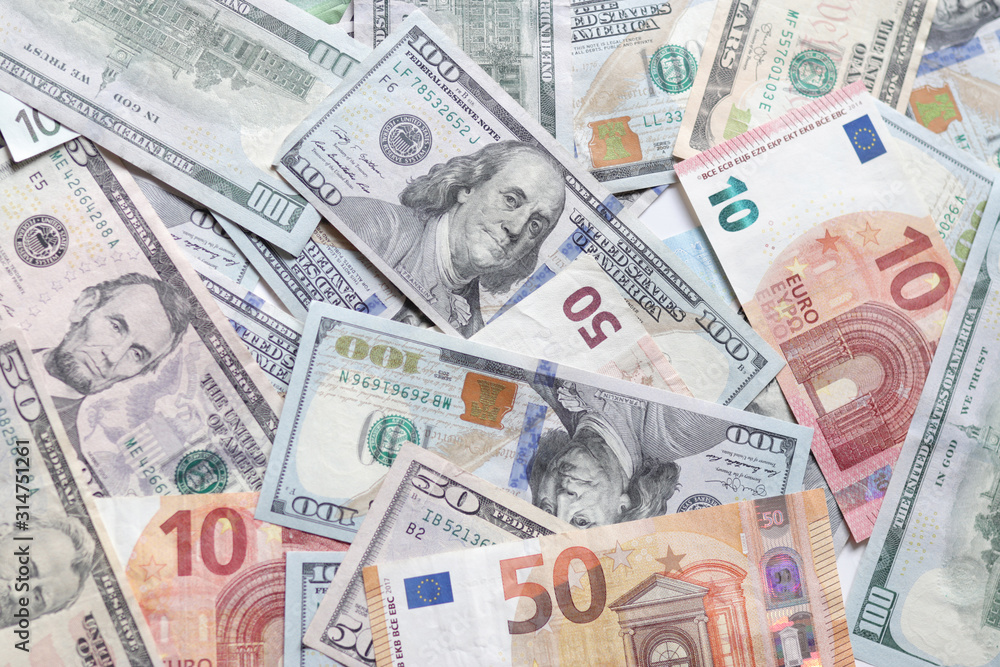 International currencies background. Money from different countries: dollars, euros. euro and dollar banknotes. money background. leading currencies. International currencies background. Money from different countries: dollars, euros. euro and dollar banknotes. money background. leading currencies.