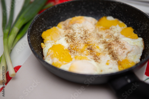 fried eggs on a pan. Egg omelet