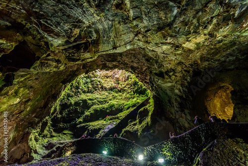 algar do carvalho, view of the cave algar do cavalho an hole in the heart of the earth. terceira, azore, portugal photo