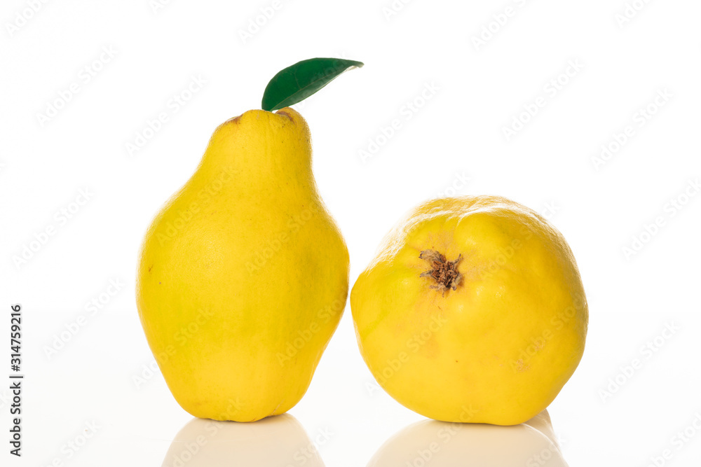 yellow ripe quince on white background