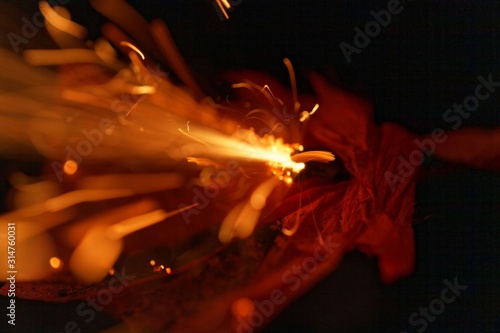 Macro photo of an exploding firecracker.