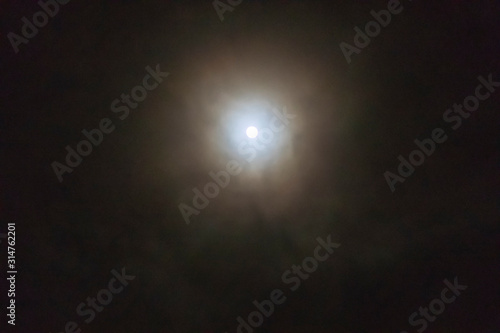 full moon. Photo taken at night. Soft focus. Tinted