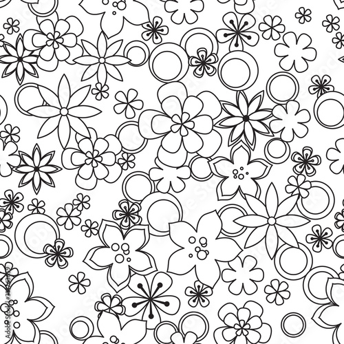 Seamless pattern made of black and white flowers.