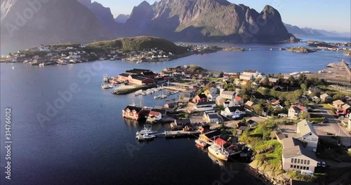 4K Reine Lofoten islands. Beautiful scenery of the town of Reine. Birds eye view drone footage