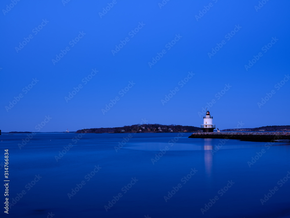 Blue hour at the Spring Ledge Lighthouse on Casco Bay in South Portland Maine