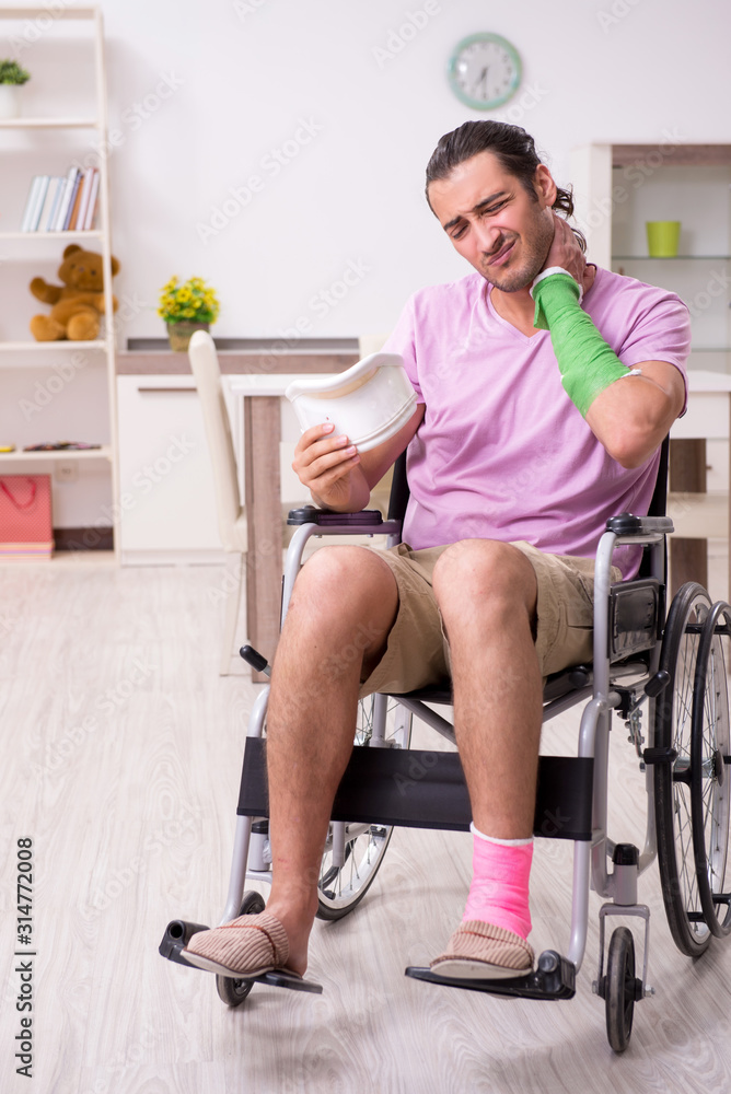 Fototapeta premium Young man suffering at home after car accident