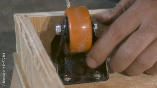 Plywood screwing process close up
