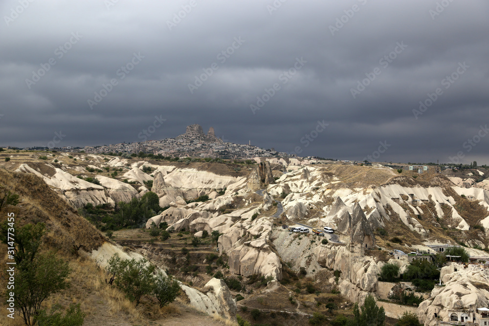 Goreme, Turkey - 09/15/2019: Volcanic rocks of an unusual shape in the vicinity of the village of Goreme in the Cappadocia region in Turkey.