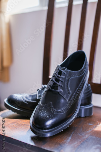 A pair of black leather shoes for the wedding day or working in the office.