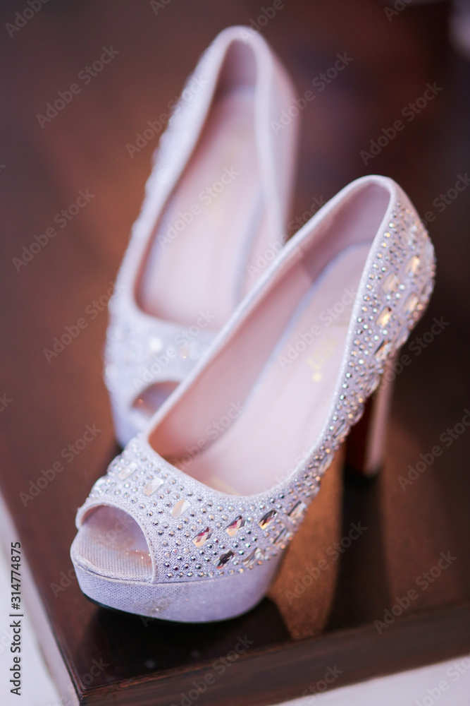The shoes or high heels used by the bride during the wedding ceremony. The shoes or high heels used by the bride during the wedding ceremony.