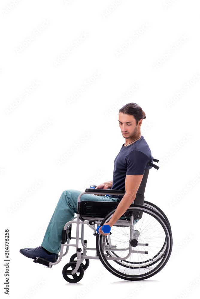 Young disabled man doing physical exercises isolated on white Young disabled man doing physical exercises isolated on white