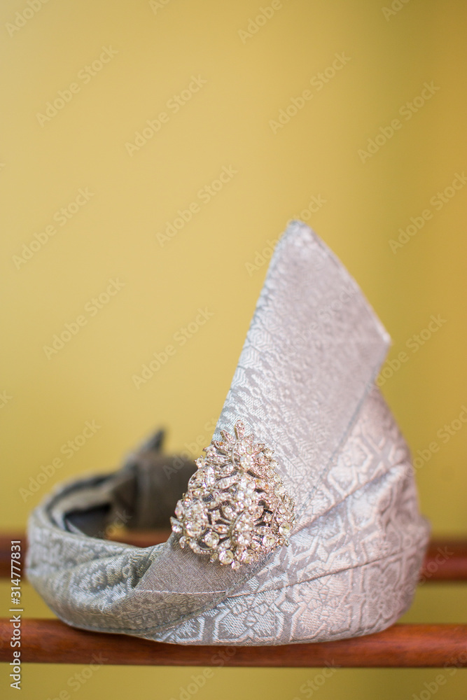 'Tanjak' is a head attire used by Malay groom in wedding ceremony in