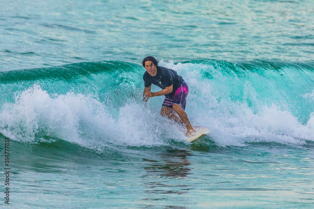 Australian Surfer riding a wave in Sydney