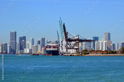 Wide angled view of the Port of Miami with Miami tall building skyline in the background 
