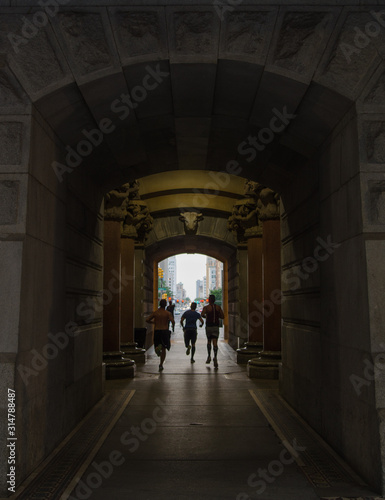People running down a tunnel © Arri