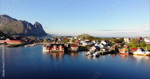 4K Reine Lofoten islands. Beautiful scenery of the town of Reine. Birds eye view drone footage