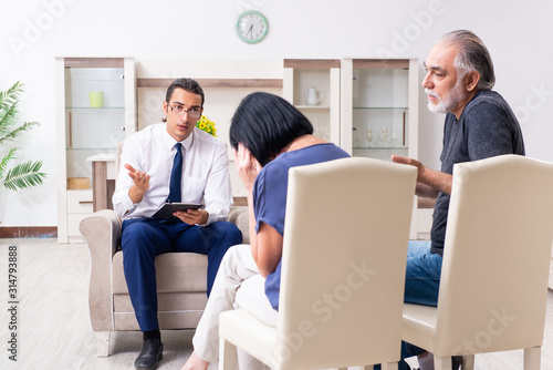 Old couple visiting psychiatrist doctor