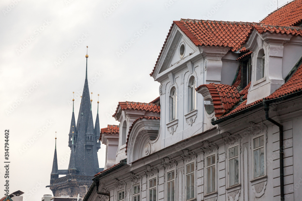 Austro-Hungarian Facade of a baroque appartment residential building in a street of old town, the historical center of Prague, Czechia in the most touristic part of the city