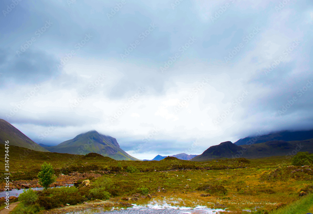 landscape with mountains and clouds