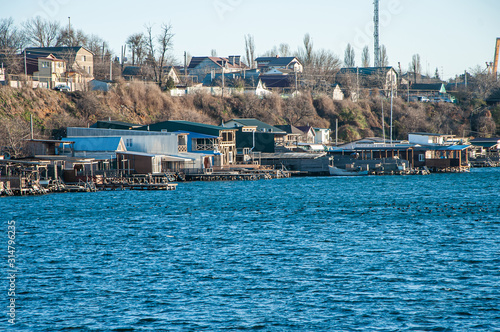 Private houses ownership right on the seashore standing on the water.